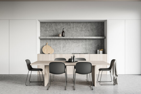 Cozy kitchen room interior with dining table and six chairs