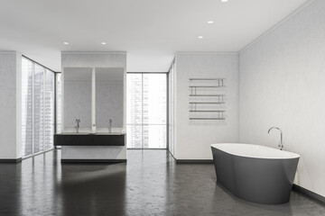 Fototapeta na wymiar Black-and-white bathroom with panoramic windows, partition, towel rack and dark tub