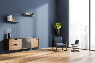 Living room interior with panoramic window, armchair and laptop