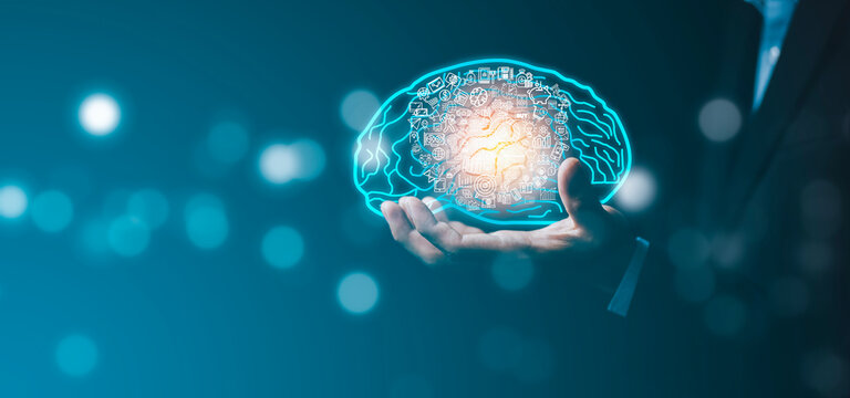 Businessman hold brain icon and line control in graph Screen Icon of a media screen, Technology Process System,Concept Futuristic medicine, the human body, and the future, brain. Online consultation.