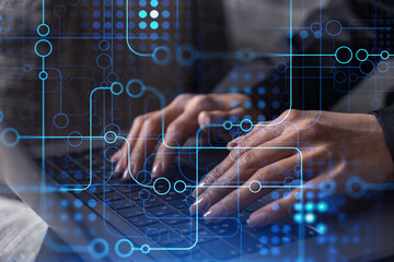 Woman typing the keyboard to create innovative software to change the world and provide a completely new service. Close up shot. Hologram tech graphs. Concept of Dev team. Formal wear.