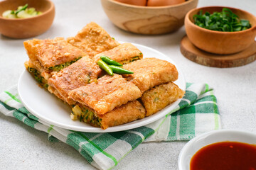 Martabak Telor or Martabak Telur. Savory pan-fried pastry stuffed with egg, meat and spices.