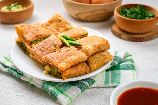 Martabak Telor or Martabak Telur. Savory pan-fried pastry stuffed with egg, meat and spices.