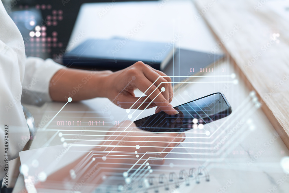 Poster businesswoman in formal wear holding in the hands a smart phone and testing an innovative applicatio