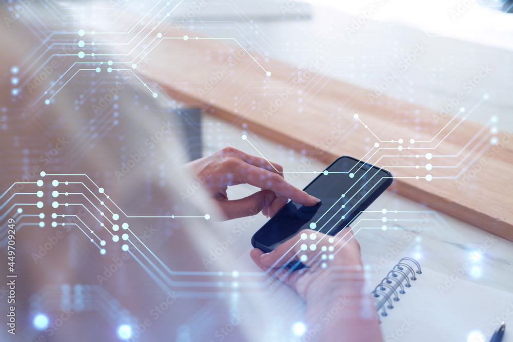 Poster businesswoman in formal wear holding in the hands a smart phone and testing an innovative applicatio