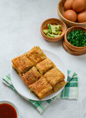 Martabak Telor or Martabak Telur. Savory pan-fried pastry stuffed with egg, meat and spices.
