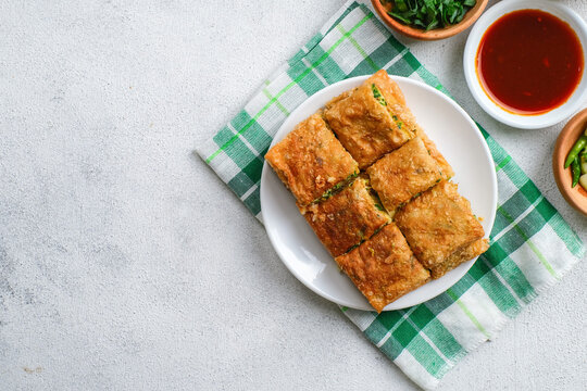 Martabak Telor or Martabak Telur. Savory pan-fried pastry stuffed with egg, meat and spices.
