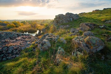 Fototapeta na wymiar Aktovsky Canyon in Ukraine surrounded large stone boulders