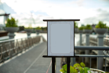 sign hanging outside a restaurant, store, office or other