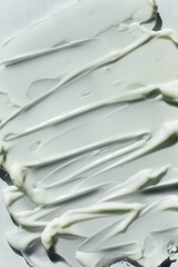 Beauty skincare cream texture. White lotion, moisturizer, creamy cosmetic product background
