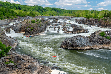 Kayak upside down in the Potomac river on a cloudy day