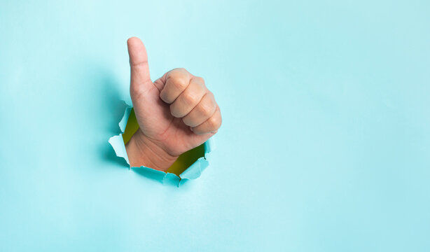 Effect result concepts with hand showing thumb up on blue background. - Powered by Adobe