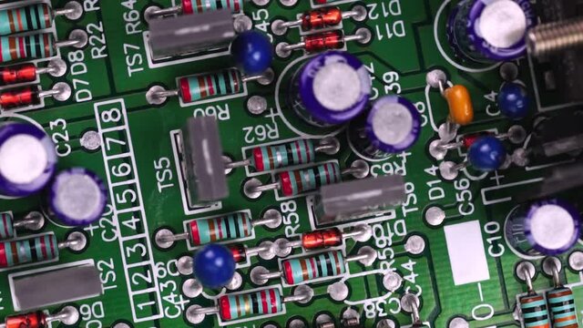  circuit motherboard detail with electronic components. Micro chips, capacitors or resistorstechnology.
