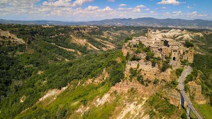 Fototapeta na wymiar Approaching medieval town of Civita di Bagnoregio from a drone, Italy.
