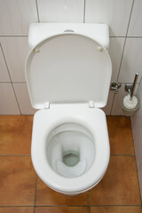 New ceramic toilet bowl indoors, top view