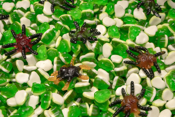 Multicolored jelly stick candies textured background