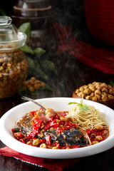 Delicious Chinese cuisine, sauteed fish head with pickled peppers