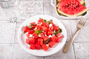 Salad with watermelon, feta cheese and mint leaf