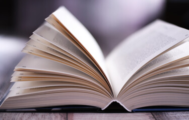 Composition with open book on the table
