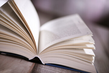 Composition with open book on the table