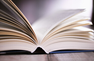 Composition with open book on the table