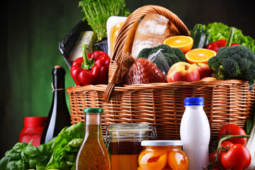 Wicker basket with assorted grocery products