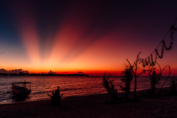 Sunset or sunrise at tropical beach on sea in Gili island