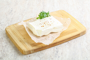 Greek Feta cheese over board