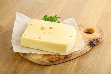 Maasdam cheese over the board