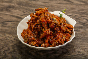 Canned anchovy in tomato sauce