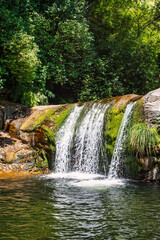 Beautiful Landscape Of Nature Without People With A Nice Waterfall Or Stream. Natural Pool, The...