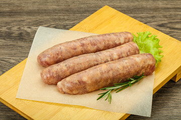 Raw pork meat sausages for grill
