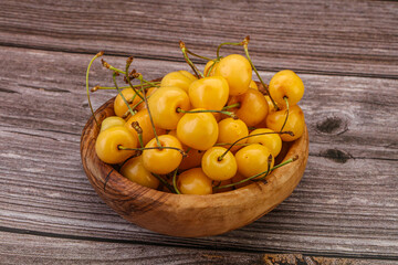 Sweet ripe yellow cherry heap