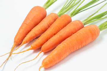 Fresh ripe carrots on a white background. Isolated carrot