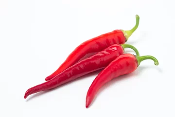 Fotobehang Red hot chili peppers on a white background. Chili pepper isolated © Ruzanna