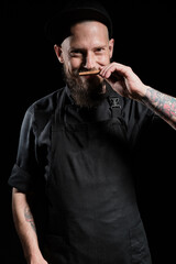 Chef portrait smelling cinnamon stick
