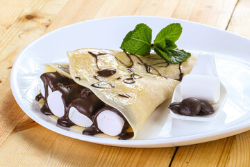 Pancake with marshmallow and chocolate