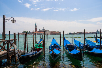 Venice, view of the pier with gondolas