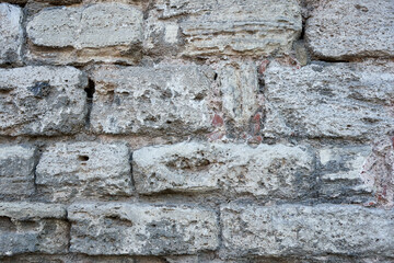 Old stone bricks wall texture close up
