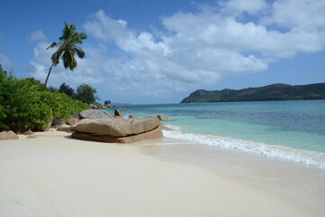 Seychelles beach with cloudy sky