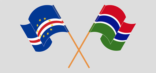 Crossed and waving flags of Cape Verde and the Gambia