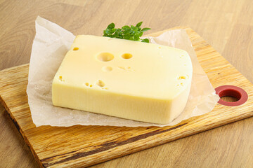 Maasdam cheese over the board