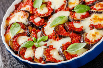 eggplant parmigiana in a baking dish, top view