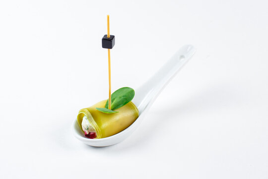 canapes with a skewer on a white background close up