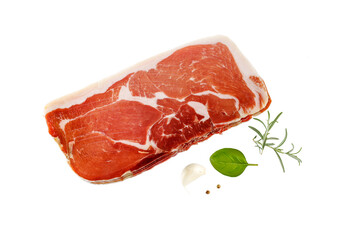Traditional spanish jamon slices (dried pork meat) and fresh herbs isolated on white