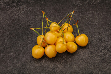 Sweet ripe yellow cherry heap