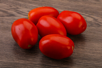Red bright tasty tomato heap
