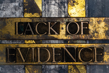 Lack of Evidence text message on textured grunge copper and vintage gold background
