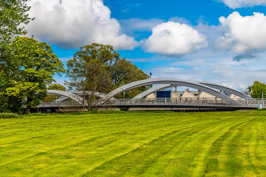 A view of a bridge over the River Lossie beside Elgin Cathedral, Scotland on a summers day