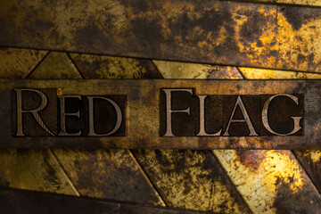 Red Flag text on vintage textured silver grunge copper and gold background